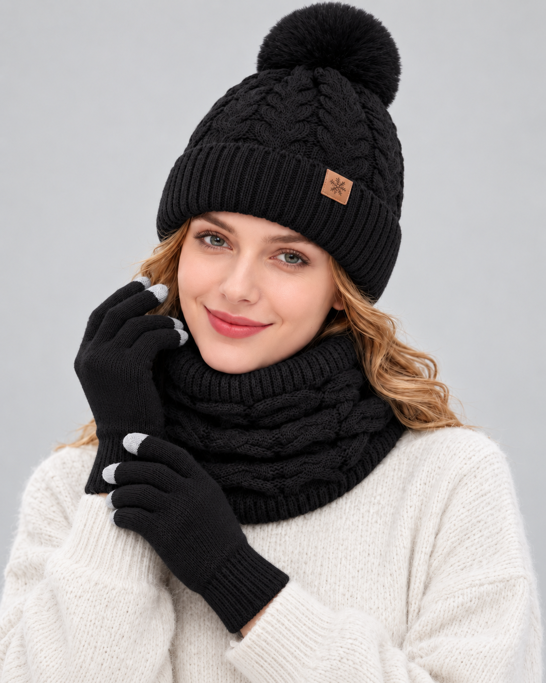 Ensemble hiver femme 3 pièces noir porté par un mannequin